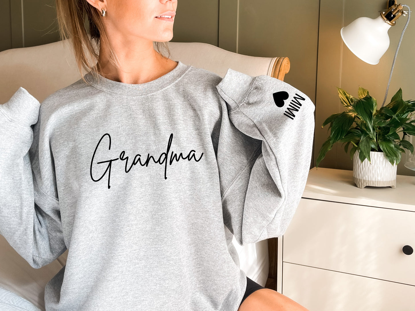 Custom Grandma Embossed Sweatshirt with Name on Sleeve