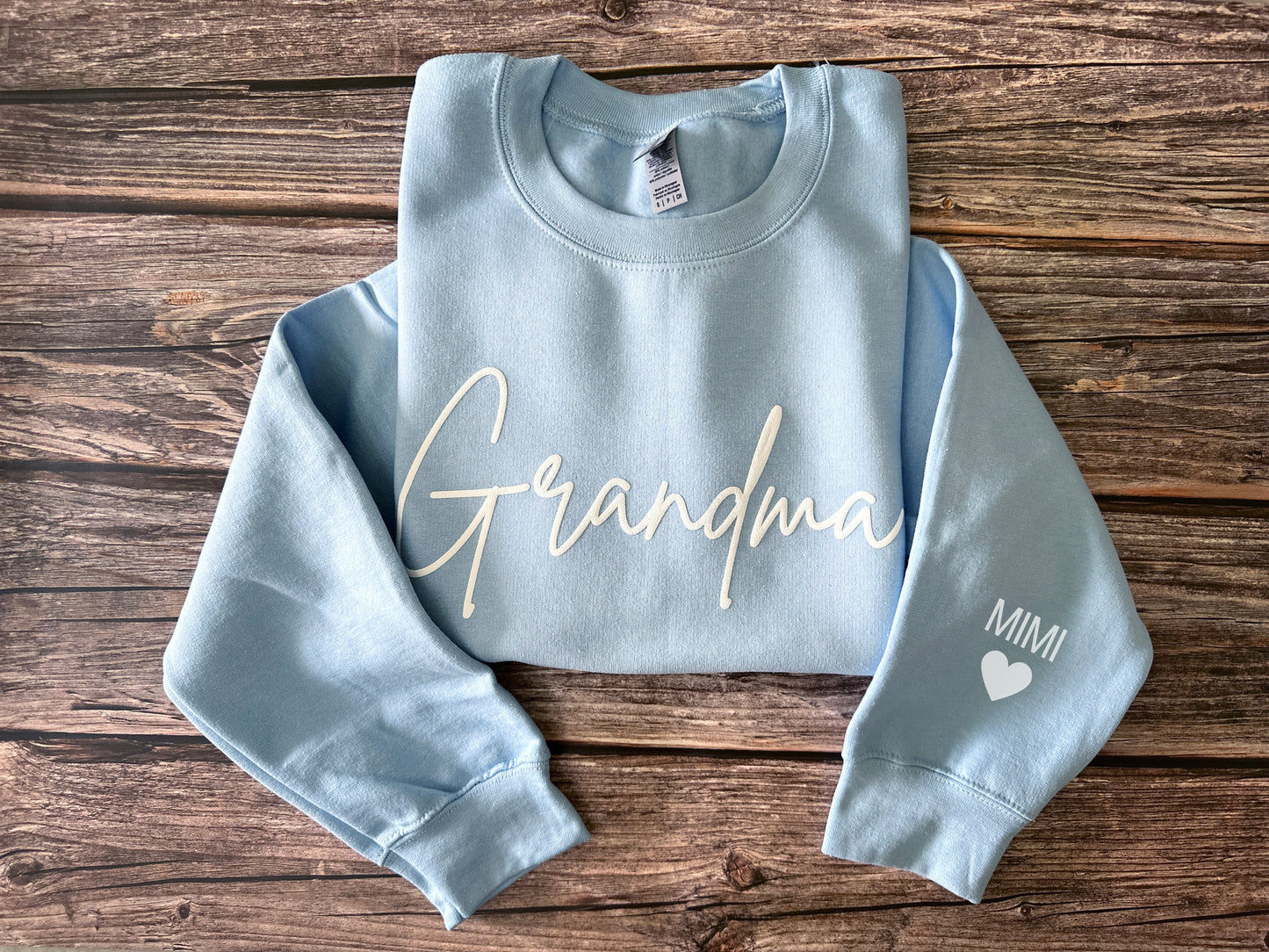 Custom Grandma Embossed Sweatshirt with Name on Sleeve